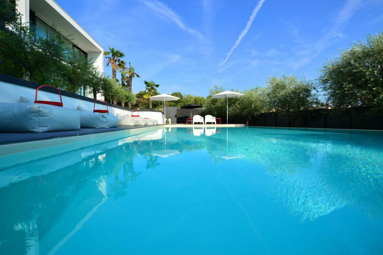 Extra Urbano - Lago Di Garda - Adults Only ปอนติ ซุล มินโช ภายนอก รูปภาพ